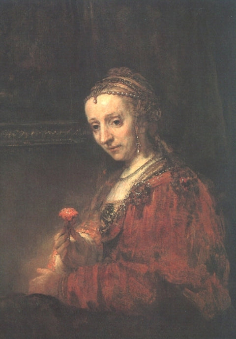 Mujer con un rosa